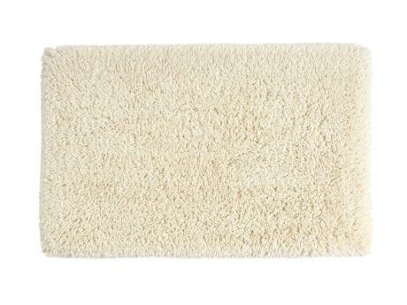Abyss & Habidecor Shag luxury bath mat with ultra-plush high-pile cotton texture in soft ivory tone