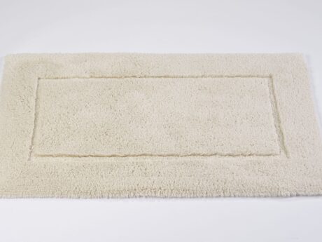 Abyss & Habidecor Must ivory bath mat with border