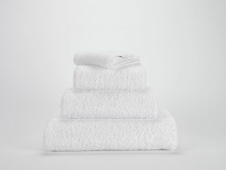 Abyss & Habidecor Super Pile 100 luxury white cotton towel set stacked