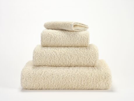 Abyss & Habidecor Super Pile 101 luxury cotton towels in ivory stacked