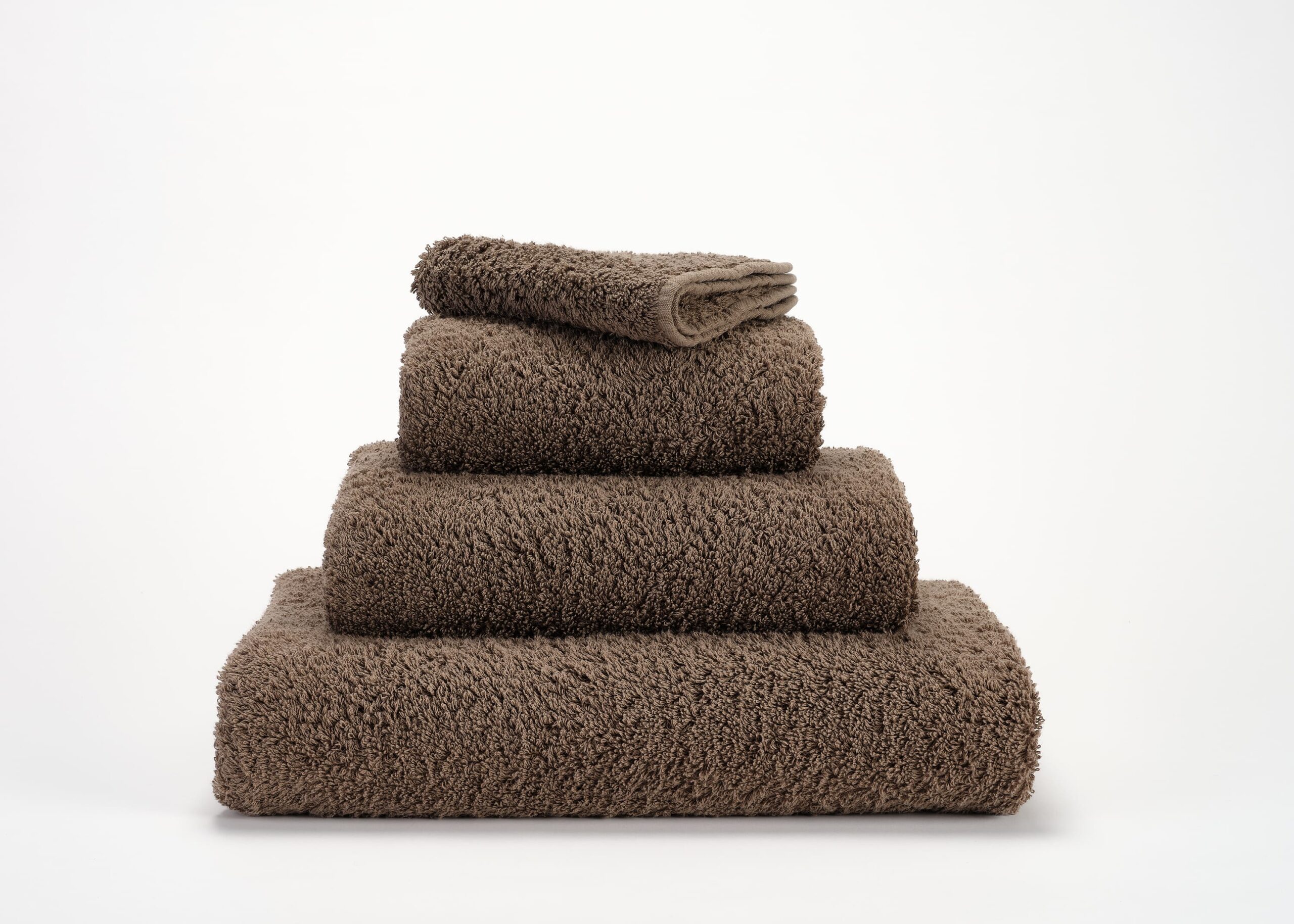 Abyss & Habidecor Super Pile 771 luxury cotton towels in taupe stacked