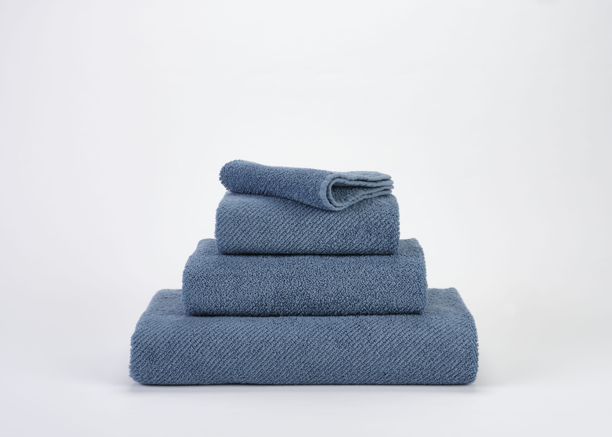 Abyss & Habidecor Twill 100 blue luxury Egyptian cotton towels stacked set