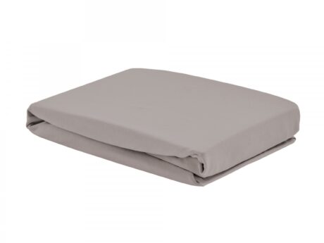 Christian Fischbacher Jersey Uni fitted sheet folded in warm taupe, showing the soft matte cotton jersey surface and deep elasticated corner