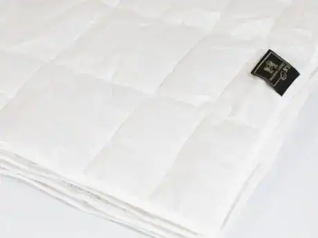 Folded Traumina Luxury N°1 duvet with elegant quilted stitching