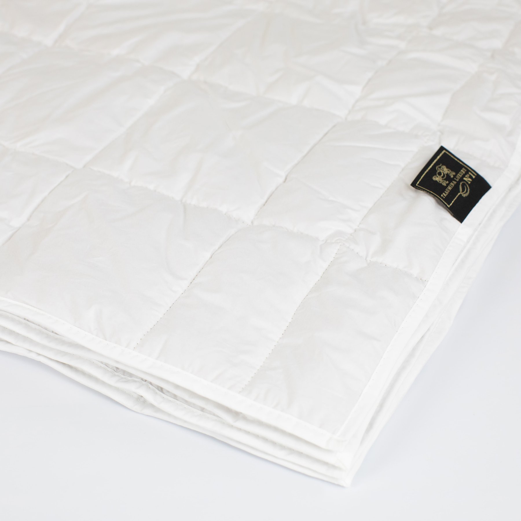 Folded Traumina Luxury N°1 duvet with elegant quilted stitching