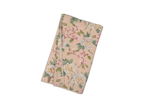 Feiler floral cotton throw blanket in soft beige with rose and blossom pattern folded elegantly.