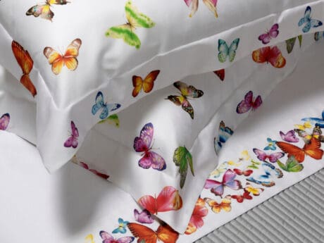 Dea Farfalle cotton sateen bed linen with a colourful butterfly print