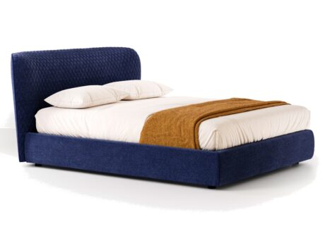 Bolzan Letti Corolle bed in navy with quilted headboard, three-quarter view