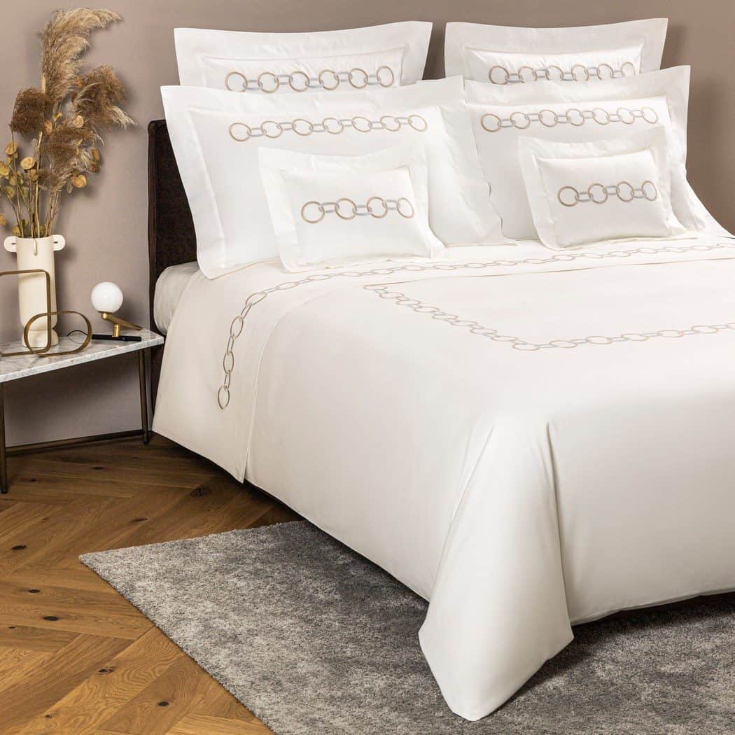 Frette Links Embroidery bed linen set on a double bed
