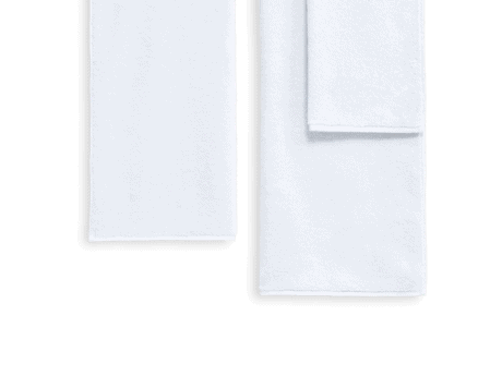Weseta Dreampure towels in white hanging on a towel rail